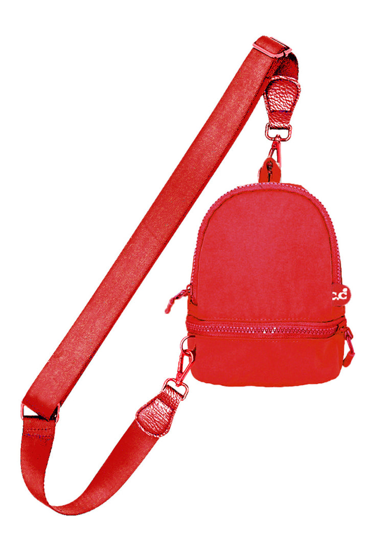 Red C.C Mini Solid Sling Backpack offers a compact yet functional design, perfect for hands-free convenience. Crafted with durable materials, it ensures long-lasting use while providing secure storage for essentials. Its adjustable strap allows for a comfortable fit, making it ideal for daily errands or travel. This sleek backpack combines practicality with style, delivering expert-level utility in a minimalist package. 