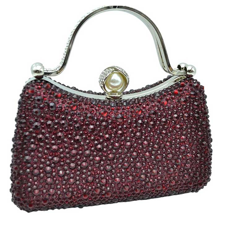 Red Crystal Diamond Top Handle Embellished Evening Clutch Bag is a remarkable evening bag, crafted from premium materials with a crystal diamond top handle for a special touch. Featuring a soft-textured fabric lining and a stylish, elegant exterior, this clutch bag is ideal for special occasions. 