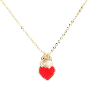 Red Enamel Heart Pearl Pendant Necklace, is a stunning addition to any jewelry collection. With its delicate heart-shaped pendant and lustrous pearl, this necklace adds a touch of elegance to any outfit. Handcrafted with high-quality enamel and a pearl, this necklace is a timeless piece that is sure to impress.