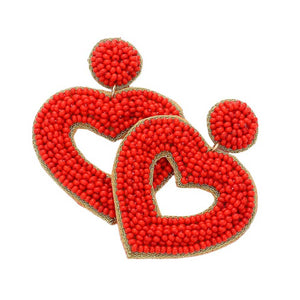 Red Felt Back Seed Beaded Open Heart Dangle Earrings, are fun handcrafted jewelry that fits your lifestyle, adding a pop of pretty color. Take your love for statement accessorizing to a new level of affection with these beautiful earrings! Highlight your appearance, and grasp everyone's eye at any party or any occasion. 