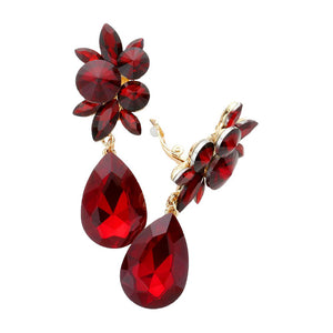 Red Glass Crystal Teardrop Clip On Earrings, add a touch of sparkle to any outfit. Crafted with lead-free glass crystals, they feature a tear-drop design and secure clip-back fastening for a comfortable fit. Perfect for any special occasion or as an exquisite gift to someone you love. 