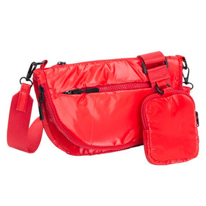 Red Glossy Puffer Half Moon Crossbody Bag, the lightweight, stylish design features a durable water-resistant nylon that is perfect for outdoor activities. The adjustable shoulder strap makes it easy to sling across your body for hands-free convenience. Carry your essentials in style and comfort with this fashionable bag.