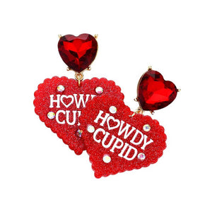 Red HOWDY CUPID Message Resin Heart Stone Dangle Earrings are perfect for adding a touch of romantic charm to any outfit. With a playful message and unique resin heart design, these earrings are sure to catch the eye and spread some love. Crafted with quality materials, they are durable and lightweight for all-day wear.