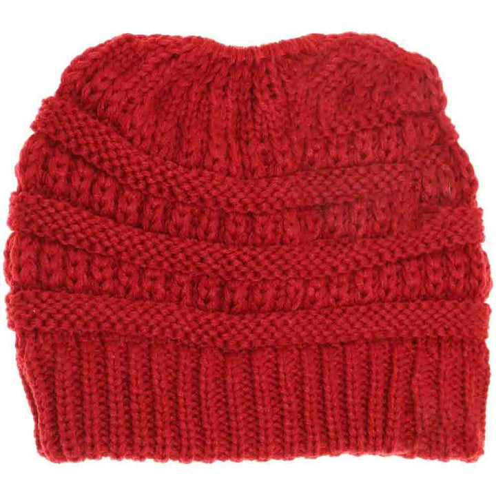 Red Kids Solid Classic CC Beanie Tail combines timeless style with practical comfort. Designed with a soft, durable fabric, it provides warmth while allowing a ponytail or bun to fit through the open tail hole comfortably. Ideal for active children, this beanie ensures a secure and cozy fit during outdoor activities in cooler weather. Its solid color and classic design make it versatile for everyday wear or layering under helmets and hoods.