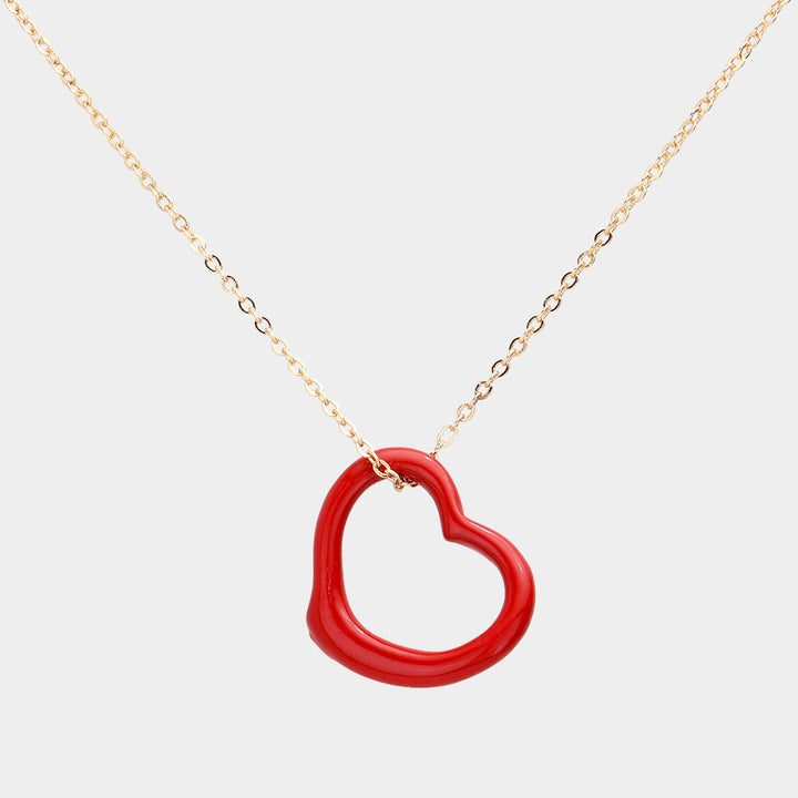 Red Metal Heart Cut-Out Pendant Necklace showcases a modern cut-out design, adding a touch of elegance to any outfit. Made with high-quality materials, this necklace is both durable and stylish. Elevate your look with this versatile accessory that perfectly blends beauty and functionality. 