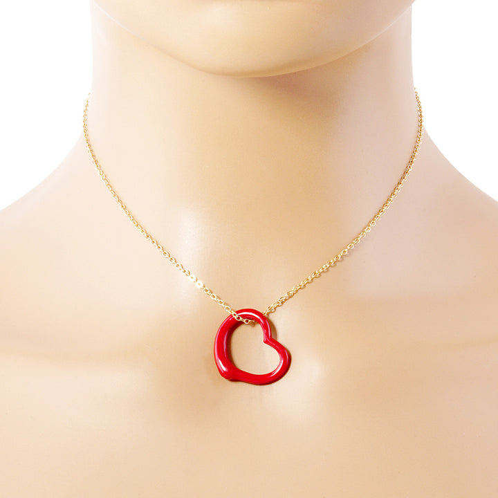 Red Metal Heart Cut-Out Pendant Necklace showcases a modern cut-out design, adding a touch of elegance to any outfit. Made with high-quality materials, this necklace is both durable and stylish. Elevate your look with this versatile accessory that perfectly blends beauty and functionality. 