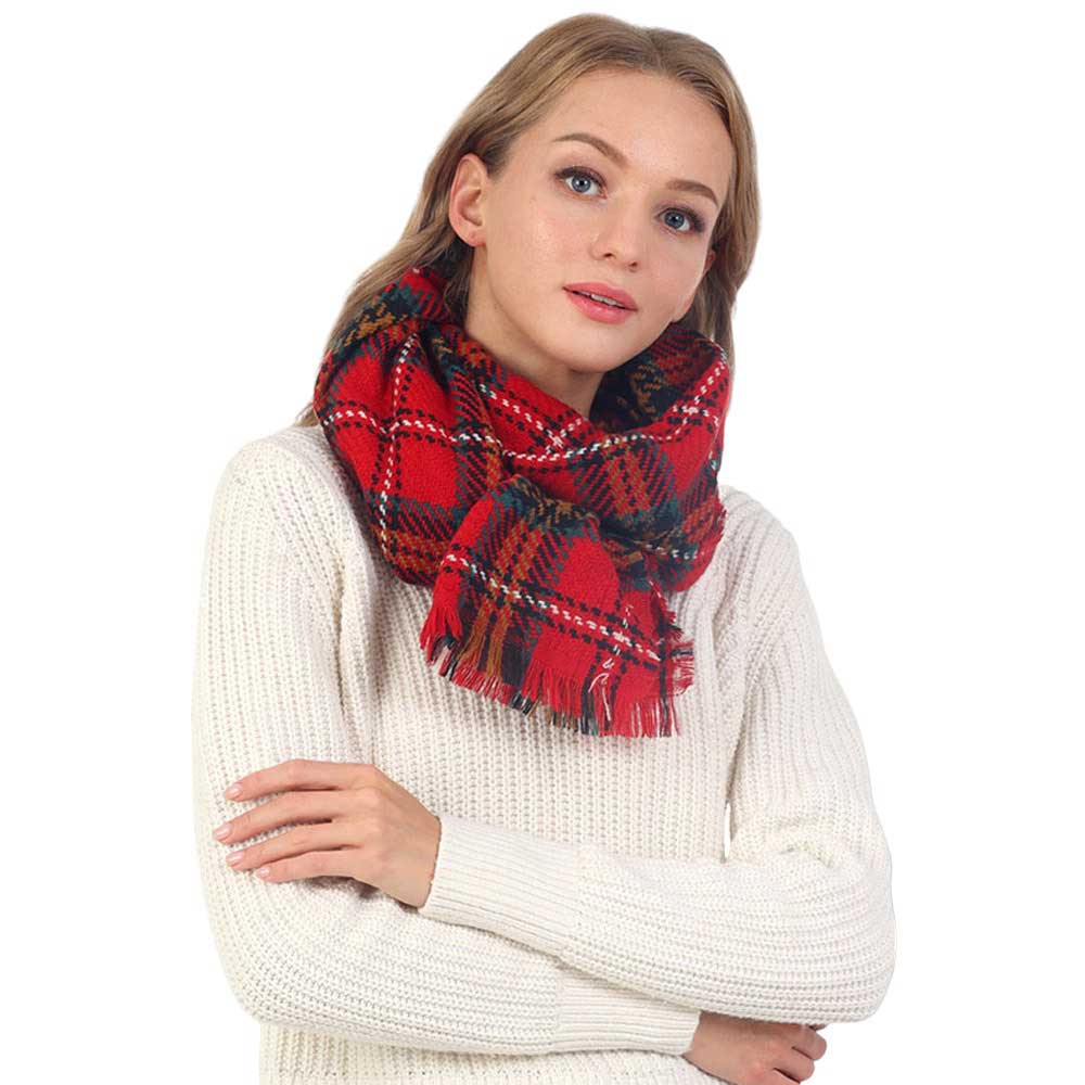 Red Plaid Check Patterned Fringe Oblong Scarf is perfect for adding a touch of elegance to any outfit. Crafted from a high-quality fabric, it features an intricate plaid pattern with delicate fringe detailing, an oblong shape, and a soft, lightweight texture. Perfect for gifting, & dressings up on cooler days or evenings.