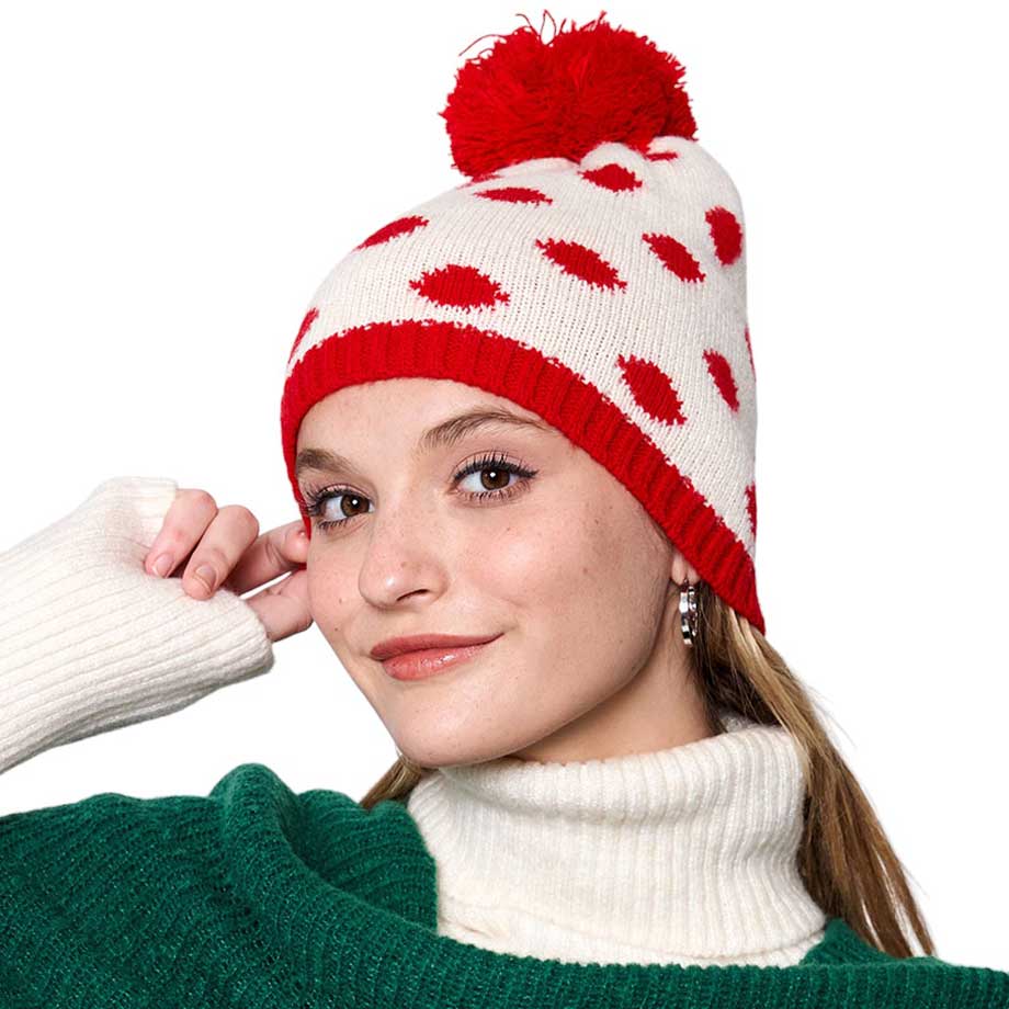 Red Polka Dot Pom Pom Beanie Hat, Protect yourself from the cold with this fashionable and cozy beanie. This stylish beanie features a soft fleece lining and an all-over polka dot design for a playful look. Perfect for winter outdoor activities or daily wear. Fashionable Christmas gift idea for family members and friends.