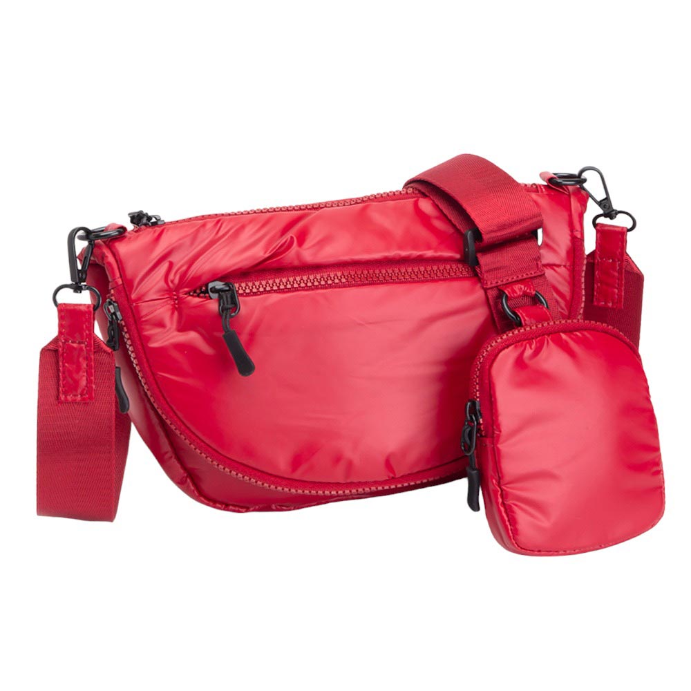 Red Puffer Half Moon Crossbody Bag, the lightweight, stylish design features a durable water-resistant nylon that is perfect for outdoor activities. The adjustable shoulder strap makes it easy to sling across your body for hands-free convenience. Carry your essentials in style and comfort with this fashionable bag.