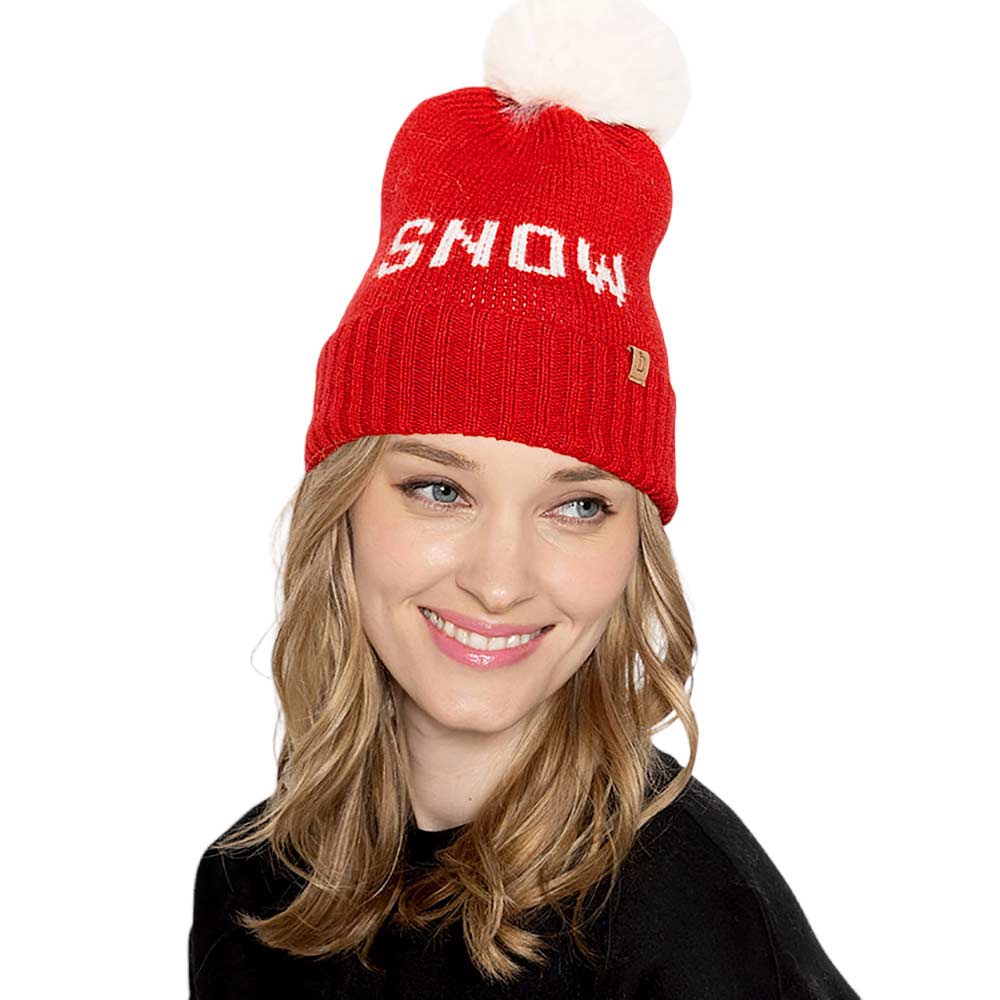 Red Snow Message Faux Fur Pom Pom Cable Knit Beanie Hat, Keep your head warm and stylish this winter with this hat. This fashionable beanie is made from soft, cable-knit fabric. Perfect gift choice in winter days for young adults, fashion forwarded friends & family members, teenagers, fashion enthusiasts, and yourself.
