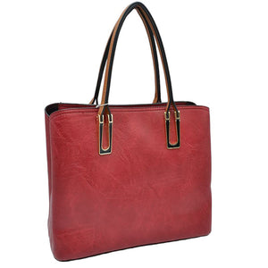 Red Solid Faux Leather Tote Bag Shoulder Bag, is perfect for the modern woman. Crafted with genuine faux leather, this stylish bag is durable, light, and spacious, and with adjustable straps, it is perfect for everyday use. Its sleek design will have you turning heads wherever you go.