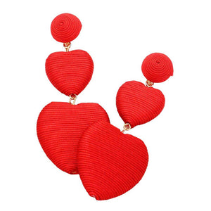 Red Thread Wrapped Double Heart Dropdown Earrings are a versatile and stylish addition to any jewelry collection. The unique design features two intertwined hearts, symbolizing love and unity. Crafted with high-quality materials, these earrings are lightweight and comfortable to wear. Perfect for any occasion or daily wear