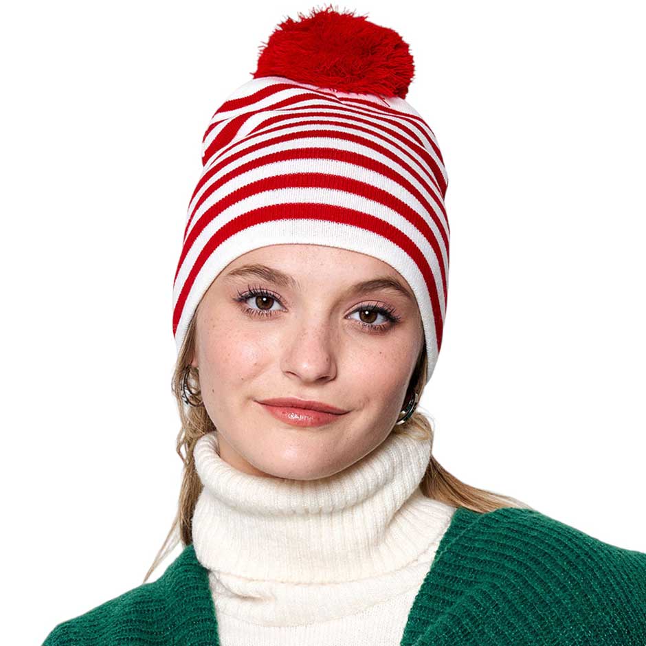 Red Two-Tone Striped Pom Pom Beanie Hat, is bound to keep you warm and fashionable. This sleek beanie is designed with striped, two-tone coloring for a timeless look, and topped with a playful pom pom for a touch of fun. Enjoy cold-weather coziness. Give this piece to your loved ones as a gift on the Christmas days.