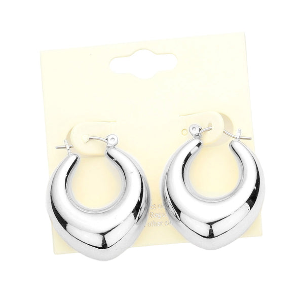 Rhodium Bold Metal Abstract Hoop Pin Catch Earrings, Make a statement with these Earrings. Crafted from durable metal with a sleek abstract design, these earrings are perfect for adding the perfect touch of impact. The pin catch closure ensures a secure and comfortable fit. An ideal gift choice for friends, and family members.