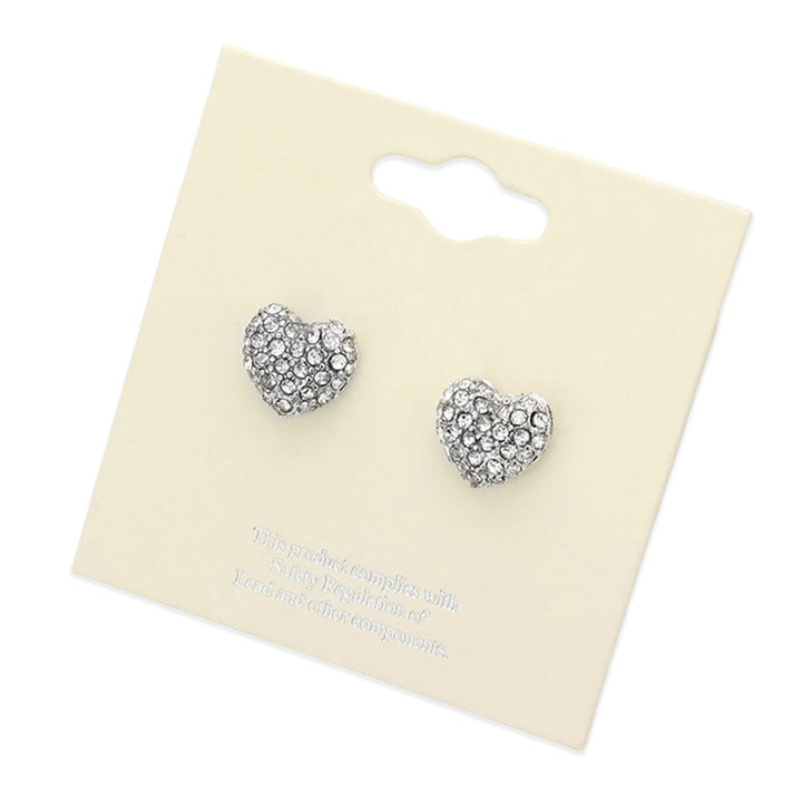 Rhodium Crystal Pave Heart Stud Earrings add elegance to any outfit. The sparkling pave design is crafted precisely, and the heart shape symbolizes love and affection, making them the perfect accessory for any special occasion.