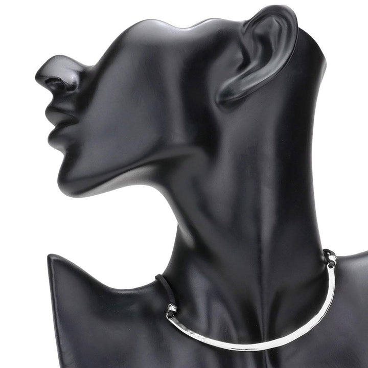 Rhodium Curved Metal Choker Necklace, this chic, choker necklace is perfect for adding a subtle, stylish touch to any look. Boasting a lightweight construction, this necklace rests comfortably and offers a modern finish to any outfit. An excellent gift item for birthdays, anniversaries, weddings, and other occasions.