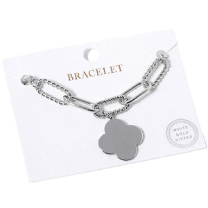 Rhodium Gold Dipped Quatrefoil Charm Bracelet, features a beautiful gold plating. The quatrefoil charm compliments the bracelet perfectly adding a distinct touch of style. This bracelet is the perfect accessory for any formal or special occasion. Perfect gift for birthdays, Valentine's Day, anniversaries, or any special day. 