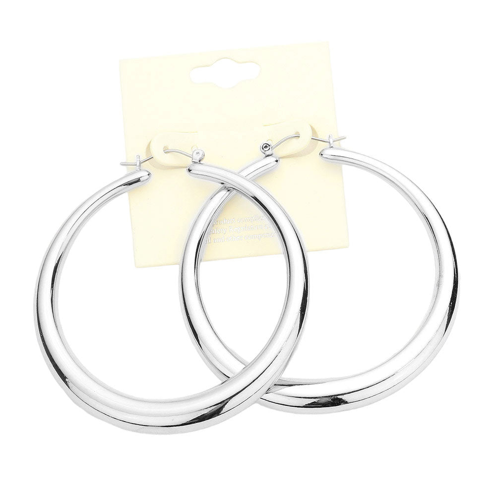 Rhodium Metal Hoop Pin Catch Earrings, are crafted from a strong metal alloy. The lightweight design ensures optimum comfort for all-day wear, and the pin catchback closure ensures a secure fit. Perfect for any occasion. A go-to staple in your wardrobe. Great gift idea for your Wife, Mom, your Loving one, or any family member.