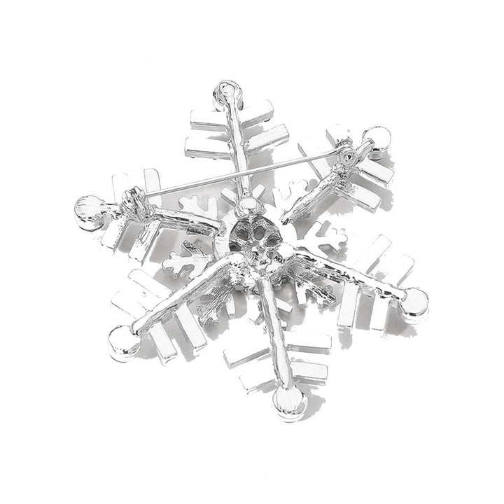 Elegant snowflake brooch adorned with shimmering crystals, perfect for adding a festive touch to coats, scarves, or winter outfits. A charming accessory that brings seasonal sparkle and refined style to any look.