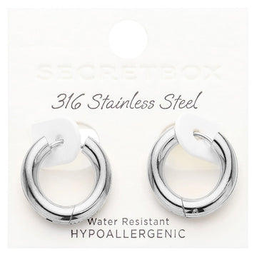 Rhodium SECRET BOX stainless steel round classic hoop earrings combine durability and style with a sleek design. Made from high-quality stainless steel, they are perfect for everyday wear and provide a classic and timeless look. Elevate your accessory game with these versatile and long-lasting earrings.