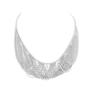 Rhodium Secret Box Draped Stone Metal Chain Bib Necklace, is a stylish accessory for any look. Featuring a secret box pendant with draped stones, it adorns any outfit elegantly. The metal chain adds a modern touch for a polished finish. Nice and thoughtful gift for loved ones. Wear it to add a touch of glamour to any occasion!