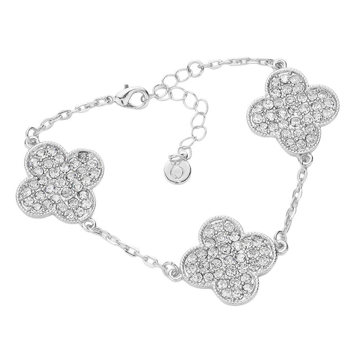 Rhodium-Triple Stone Paved Quatrefoil Link Bracelet is a stunning addition to any outfit. The exquisite design features a triple stone paved quatrefoil link that adds a touch of elegance and charm. Made with high-quality materials, this bracelet is both durable and stylish, making it the perfect accessory for any occasion.