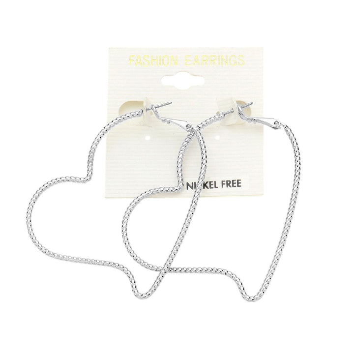 Metal Heart Hoop Earrings are a stylish and versatile addition to any jewelry collection. With their unique heart-shaped hoops, they offer a touch of romance to any outfit. Expertly crafted from durable metal, these earrings are both fashionable and long-lasting. Perfect for any occasion, these earrings are a must-have for any fashion-forward individual. 