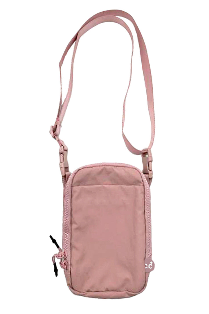 Rose C.C Small Solid Cross Body Sling Bag is a stylish yet practical accessory for on-the-go individuals. With its compact size and durable design, it allows for hands-free carrying while keeping all your essentials within reach. Crafted with quality materials, it is a reliable and fashionable choice for any occasion.