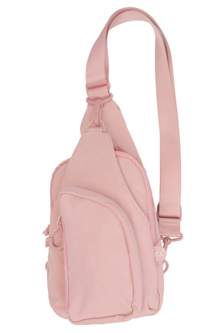 Rose C.C Solid Crossbody Sling Bag is a stylish and versatile accessory for any outfit. Its durable design and multiple compartments make it perfect for storing all your essentials, while its crossbody strap allows for hands-free convenience. Stay organized and fashionable with this must-have bag.