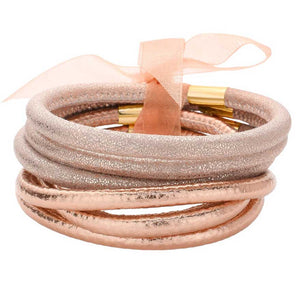 Rose Gold 6pcs Faux Leather Tube Bangle Bracelets, offers a stylish, yet affordable way to add a touch of fashion and elegance to any look. Crafted with quality materials, these bracelets are durable and designed to last. Perfect for accessorizing any outfit, these faux leather bangle bracelets will add a unique touch of class.
