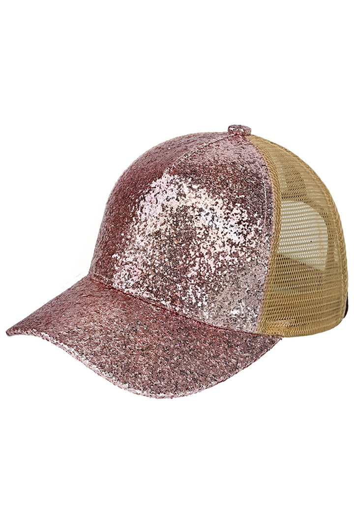 Rose Gold The C.C Glitter Trucker Cap is a stylish and functional accessory for any outdoor enthusiast. With its glitter design and breathable mesh panels, it offers both fashion and comfort. Made from high-quality materials, it is durable and perfect for everyday wear. Show off your sparkle and protect yourself from the sun with this must-have cap