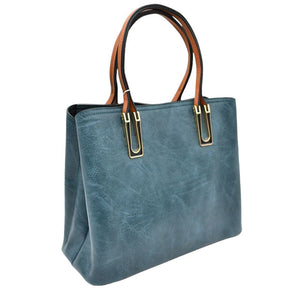 Royal Blue Solid Faux Leather Tote Bag Shoulder Bag, is perfect for the modern woman. Crafted with genuine faux leather, this stylish bag is durable, light, and spacious, and with adjustable straps, it is perfect for everyday use. Its sleek design will have you turning heads wherever you go.