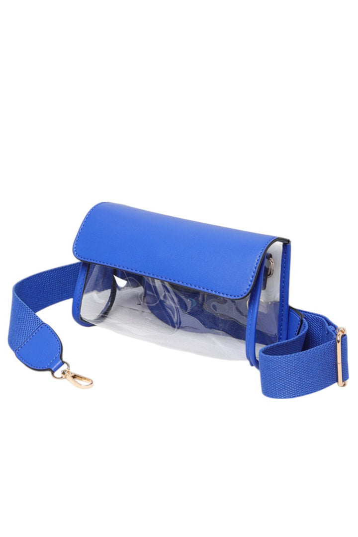 Solid Trim Clear Stadium Crossbody Bag combines transparency with reinforced solid trim for enhanced durability and style. Designed to meet stadium security requirements, it offers easy visibility of contents while maintaining a sleek, structured look. Its crossbody design ensures comfortable, hands-free wear, making it a practical choice for events where convenience and compliance are essential.