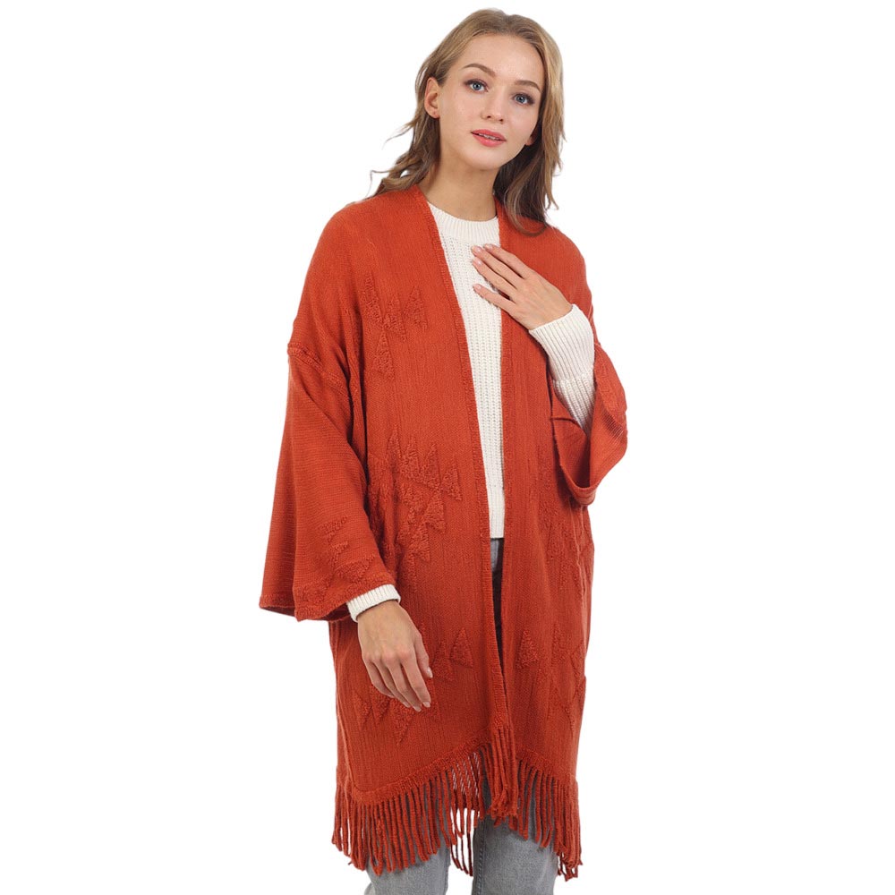 Rust Aztec Patterned Fringe Poncho, with the latest trend in ladies' outfit cover-up! the high-quality knit fringe poncho is soft, comfortable, and warm but lightweight. This tassel poncho is perfect for your daily, casual, evening, vacation, and other special events outfits. A fantastic gift for your friends or family.