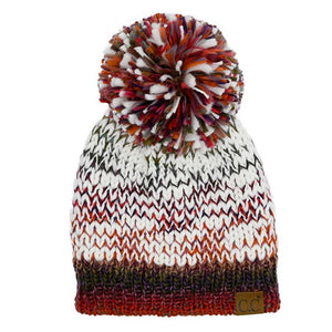 Rust C.C Multi Color Yarn Pom Pom Beanie Hat, is a great choice for the winter season. It's made of a soft, multi-colored yarn that is sure to keep you warm and toasty. The stylish pom pom detail on the top adds a touch of flair to this classic cold-weather accessory. This beanie hat is a great winter gift idea.