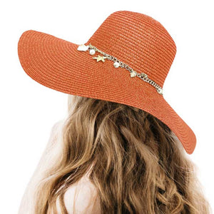 Rust Pearl Starfish Shell Charm Band Pointed Straw Sun Hat, is perfect for any beach or outdoor occasion. The beautifully crafted pearl and shell band adds a touch of glamour, while the pointed straw design provides ample shade and breathability. Stay stylish and protected from the sun with this must-have accessory. 