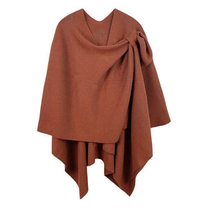 Rust Shoulder Strap Solid Ruana Poncho, with the latest trend in ladies outfit cover-up! the high-quality bling border solid neck poncho is soft, comfortable, and warm but lightweight. Stay protected from the chilly weather while taking your elegant looks to a whole new level with an eye-catching, luxurious outfit women! 