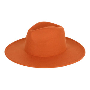 Rust Solid Fedora Panama Hat, is offering breathable comfort for the perfect summer look. The brim offers shade from the sun and the classic fedora shape makes it a timeless accessory. Look your best and stay comfortable in this stylish Solid Fedora Panama Hat. 