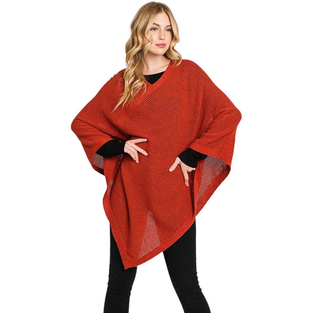 Rust Solid Knit Loose Fit Poncho, Crafted from a comforting, arctic wool blend fabric, features a loose-fitting design that will keep you cozy without compromising on style. Perfect for day-to-day wear. Look stylish and stay warm in this stylish poncho. It can be a stylish gift to family members or fashion loving friends.