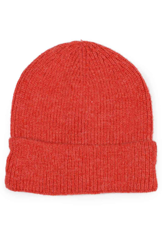 Rust The Ribbed Cuff Beanie features a classic ribbed texture with a fold-over cuff for a timeless, versatile look. Made from soft, stretchy knit fabric, it provides a snug fit and dependable warmth for everyday winter wear.