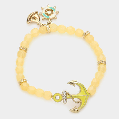 Pulsera elástica de cuentas con dije de ancla y timón de barco - Amarillo