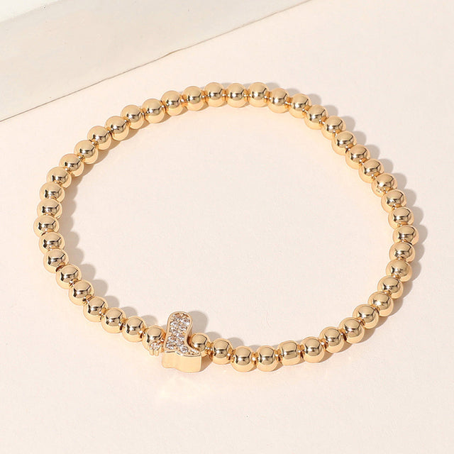 Madeline Love Gold Stone Paved Boot Brass Ball Beaded Stretch Bracelet