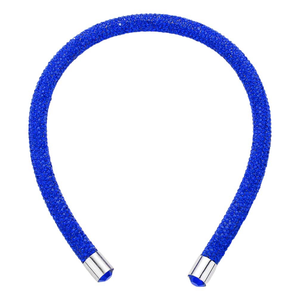 Sapphire Bling Headband. This stylish accessory is crafted with dazzling jewels and adds a touch of elegance to any outfit. Perfect for special occasions and everyday wear, the Bling Headband is sure to make a statement. Enhance your look with this must-have accessory.