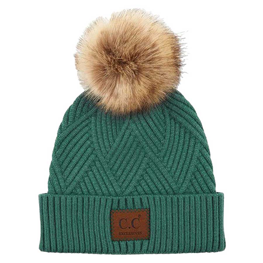 Sea Green C.C Heather Beanie Hat With Pom Pom And Suede Patch, provides excellent protection and a fashionable look with its soft heather knit material, faux fur pom pom, and stylish suede patch. The fabric is designed to keep you comfortably warm in cold weather. Add this fashionable accessory to the winter wardrobe collection.