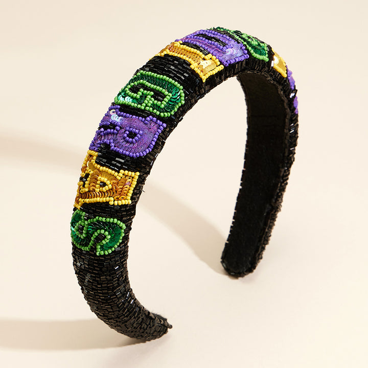 Sequin Mardi Gras Message Seed Beaded Headband is a festive and eye-catching accessory that adds the perfect touch to your Mardi Gras outfit. With its intricate seed bead design and bold sequin lettering, this headband is sure to make a statement. Get ready to celebrate in style. 