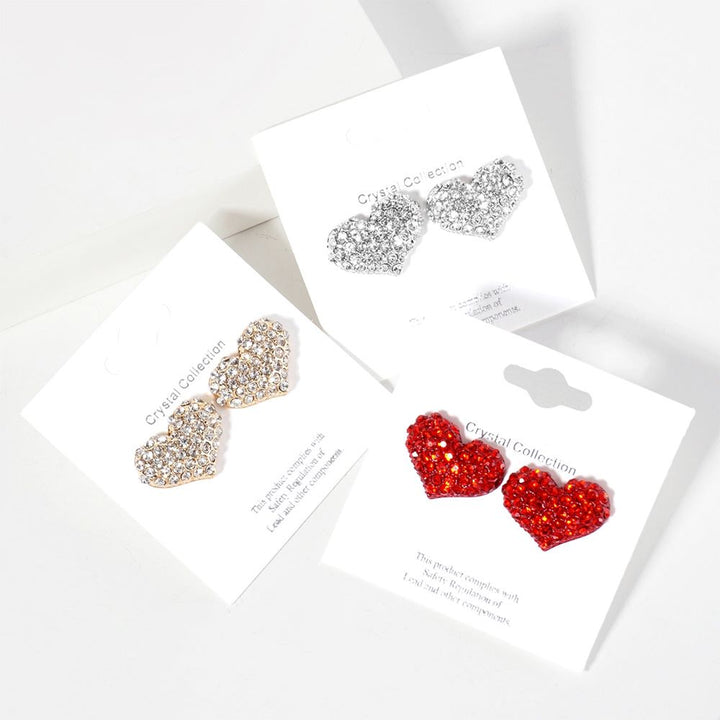 Siam-Crystal Pave Heart Stud Earrings offer a stunning addition to any outfit. The pave heart design adds a touch of elegance and sparkle, while the high-quality crystals provide a timeless shine. Perfect for both formal and casual occasions, these earrings are a must-have for any jewelry collection. 