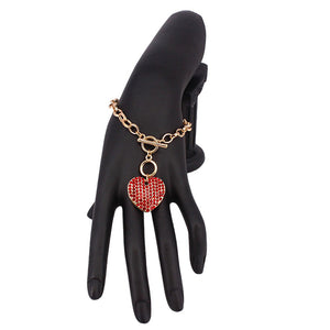 Siam Stone Paved Heart Pendant Metal Toggle Bracelet, is a must-have accessory for any fashion-forward individual. Exquisitely crafted to elevate any outfit, this bracelet is a unique addition to your jewelry collection. Its toggle closure ensures a secure fit and its elegant style will make you stand out from the crowd.