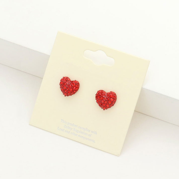 Siam Crystal Pave Heart Stud Earrings add elegance to any outfit. The sparkling pave design is crafted precisely, and the heart shape symbolizes love and affection, making them the perfect accessory for any special occasion.