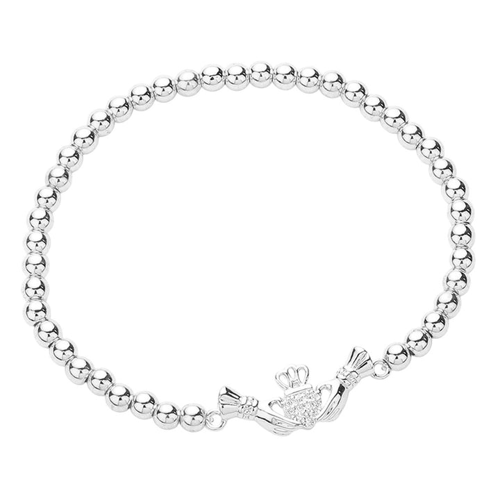 Silver  CZ Stone Paved Irish Claddagh Stainless Steel Ball Stretch Bracelet is a stunning accessory that combines a traditional Irish symbol with a modern design. The pave CZ stones add a touch of elegance, while the stretch bracelet makes it comfortable to wear. Made from durable stainless steel, it is perfect for everyday wear.