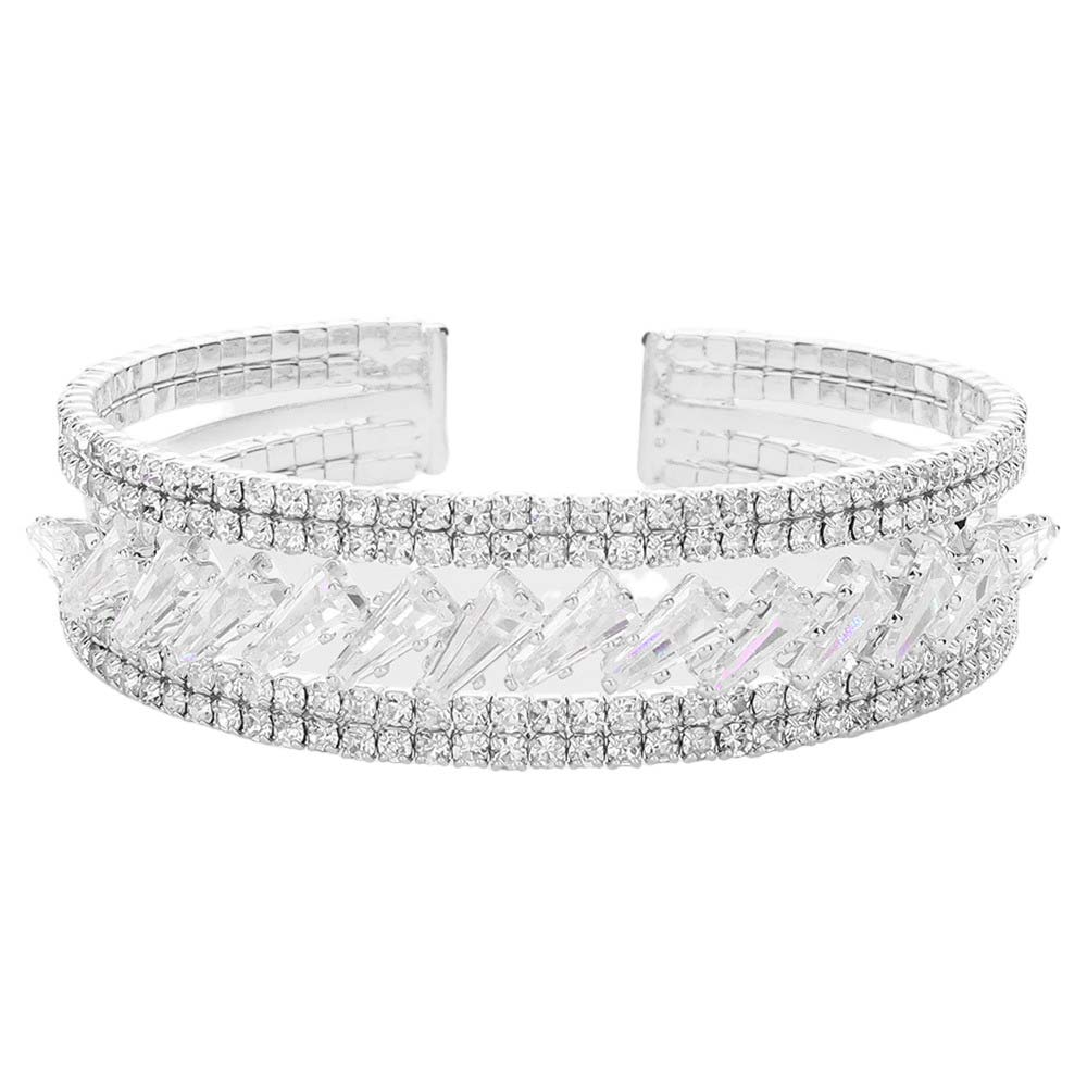 Gold CZ Tapered Baguette Stone Accented Cuff Evening Bracelet features luxurious Czech stones set in paving and prong designs. Finished with a glossy rhodium plate for an enduring shine. This timeless piece is perfect for special occasions. A perfect gift for Birthday, Anniversary, Wedding, or any other special occasion.